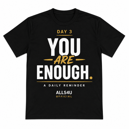 A black short-sleeve t-shirt with a motivational graphic on the front reading 'DAY 3 YOU ARE ENOUGH. A DAILY REMINDER ALLS4U OFFICIAL' in white and gold text, shown on a plain white background.